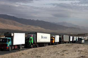 caravan of trucks in desert